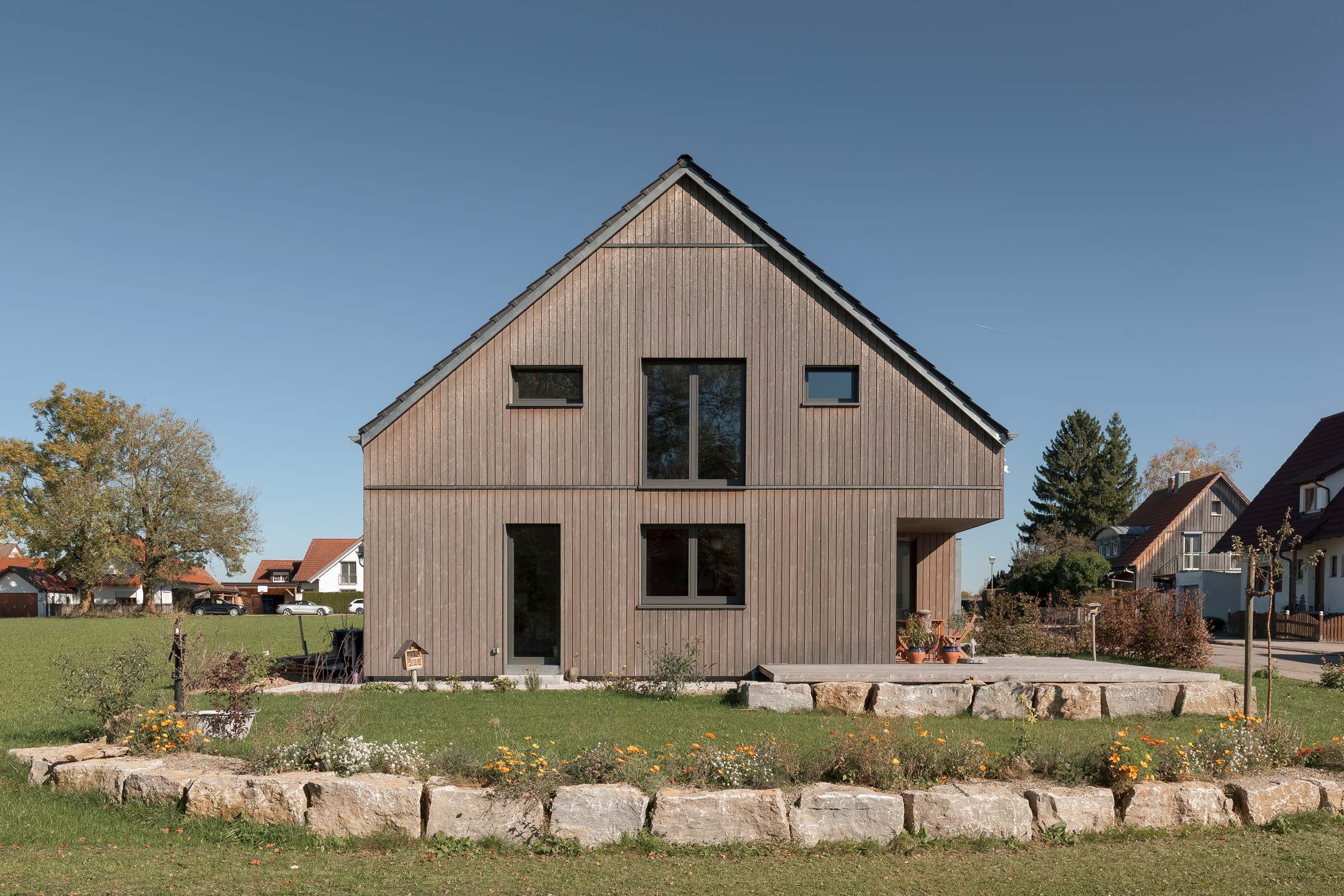 Architekturfotografie Holzhaus mit Vollholzwand von Syno R GmbH aus Lauben im Unterallgäu